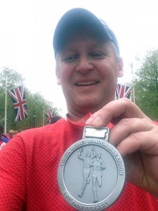 Stuart Reid with Marathon Medal