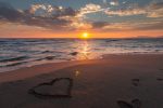 sunset at the beach - self care week blog